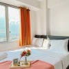 Отель Warm And Homey 2Br At Bassura City Apartment, фото 18