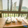 Отель Qingnian Yuesha Holiday Apartment, фото 3