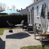 Отель Nicely Furnished Chalet with Oven near Wadden Sea, фото 25