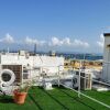 Отель Roof Top Hotel Apartment #6 King Bed - Old San Juan в Сане-Хуане-Антигуо