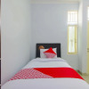 Отель Griya Wismono Homestay by OYO Rooms, фото 7