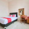 Отель OYO 2061 Rizki Dhira Guest House Syariah, фото 6