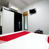 Отель OYO 465 Krung Kao Traveller Lodge, фото 23