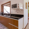 Отель Exuberante Casa com 4 Suites Perto da Praia, фото 1