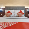 Отель OYO 90314 Stadion Guesthouse Syariah, фото 2