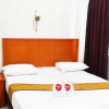 Отель OYO 717 Hotel Dharma Utama Syariah, фото 25