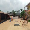 Отель OYO 93252 Garuda Bandara Guesthouse, фото 10