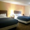 Отель Passport Inn and Suites, фото 7