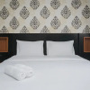 Отель Nice And Cozy Studio At Bintaro Icon Apartment, фото 4