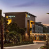 Отель La Quinta Inn & Suites By Wyndham Orlando - Idrive Theme Parks, фото 1