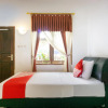 Отель OYO 3139 Naya Guest House Syariah, фото 2
