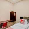 Отель OYO 90406 Joqueen Rooms, фото 2