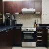 Отель Oskena Vacation Homes The Medalist Tower Sport City, фото 1