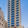 Отель Loumage Hotel & Suites в Манаме