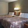 Отель Travelers Inn & Suites, фото 2