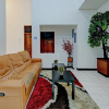 Отель Super OYO Capital O 90497 Navaya Guest House, фото 5