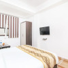 Отель OYO 13314 Grand Almada Inn, фото 13