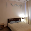 Отель Счастливые ночи в уютной квартире, фото 5