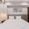 Отель Good And Homey 1Br At Branz Bsd City Apartment, фото 15