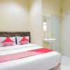 Отель OYO 544 Caraka Inn Syariah, фото 5