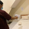 Отель RedDoorz At Kartini Residence Semarang, фото 2