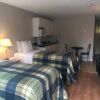 Отель Oasis by the Bay Vacation Suites, фото 5