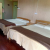 Отель OYO 90366 Home Valley Guesthouse Tambunan, фото 21