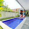Отель OYO 90337 Wiguna Homestay, фото 18