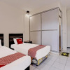Отель OYO 91861 Pemuda Kemuning Guest House, фото 16