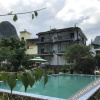 Отель Lijiang Xieshengyuan Inn, фото 2