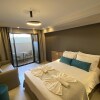 Отель Lithos Suites 101 Suite - Nikiti Halkidiki, фото 1