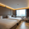 Отель Ramada Encore by Wyndham Wuhan Int'l Conference Center, фото 5