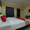 Отель OYO 43986 Tok Jah Guest House, фото 7