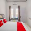 Отель Wisma Bambu Syariah by  OYO Rooms, фото 2