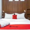 Отель De Natio Guest House Jalan Gaharu by RedDoorz, фото 19