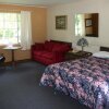 Отель Two Rivers Lodge And Cabin Rentals в Уитиере