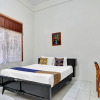 Отель SPOT ON 90539 Taman Borobudur Guest House Syariah, фото 7
