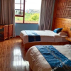Отель Yueran Wutong Hostel, фото 4