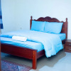 Отель Inviting 6-bedrooms Apartment in Kigali, фото 3