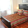 Отель East 120th Suites, фото 1
