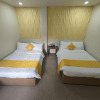 Отель OYO 1063 Manuela's Suites, фото 8