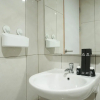 Отель Minimalist And Cozy 2Br Apartment At The Nest Near Puri By Travelio, фото 7