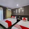 Отель Collection O 90564 Hotel Merangin Syariah, фото 6