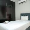 Отель Cozy 2BR @ The Empyreal Condominium Epicentrum Apartment, фото 4