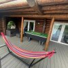 Отель Woodpecker Log Cabin with hot tub, pizza oven bbq entertainment area, lakeside with private fishing , фото 36