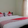Отель OYO 752 Abz Guest House Syariah, фото 8