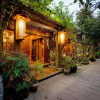 Отель Pingle Ancient Town Lijiang Hostel, фото 3