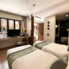 Отель Ivy Garden Hotels & Resorts - Lijiang Henghehao, фото 3