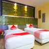 Отель Tiga Dara Kampung Wisata Hotel & Resor by OYO Rooms, фото 7