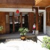 Отель Story Inn The Riveside Resort Lijiang, фото 1